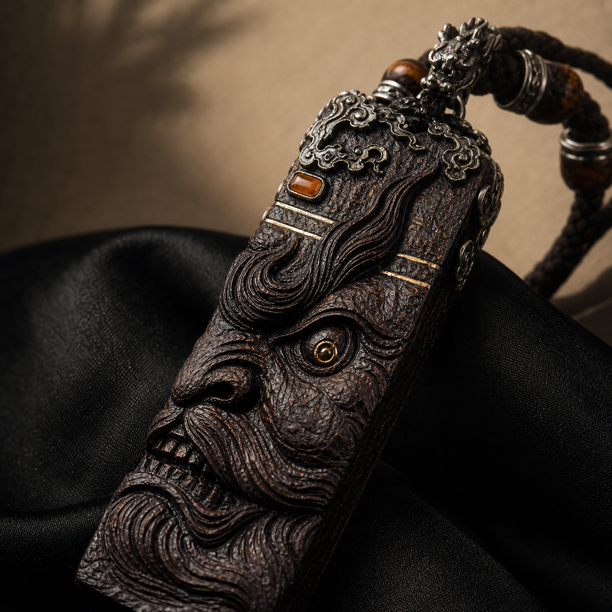 Carved face detail of the Zhong Kui pendant